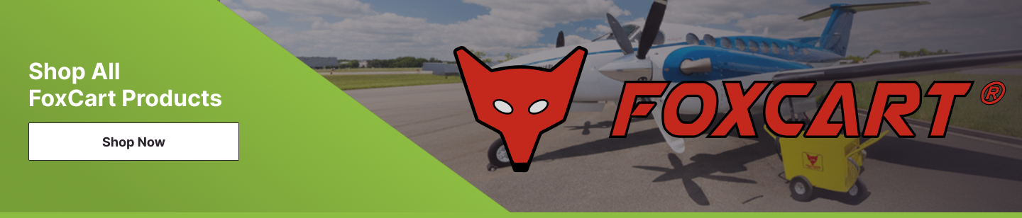 Green banner with âShop All FoxCart Productsâ and a âShop Nowâ button over a faded airport ramp scene; red fox-head FOXCART logo large over a turboprop aircraft and a yellow ground power unit.