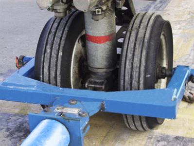 Towbar Head Attached to Aircraft Landing Gear