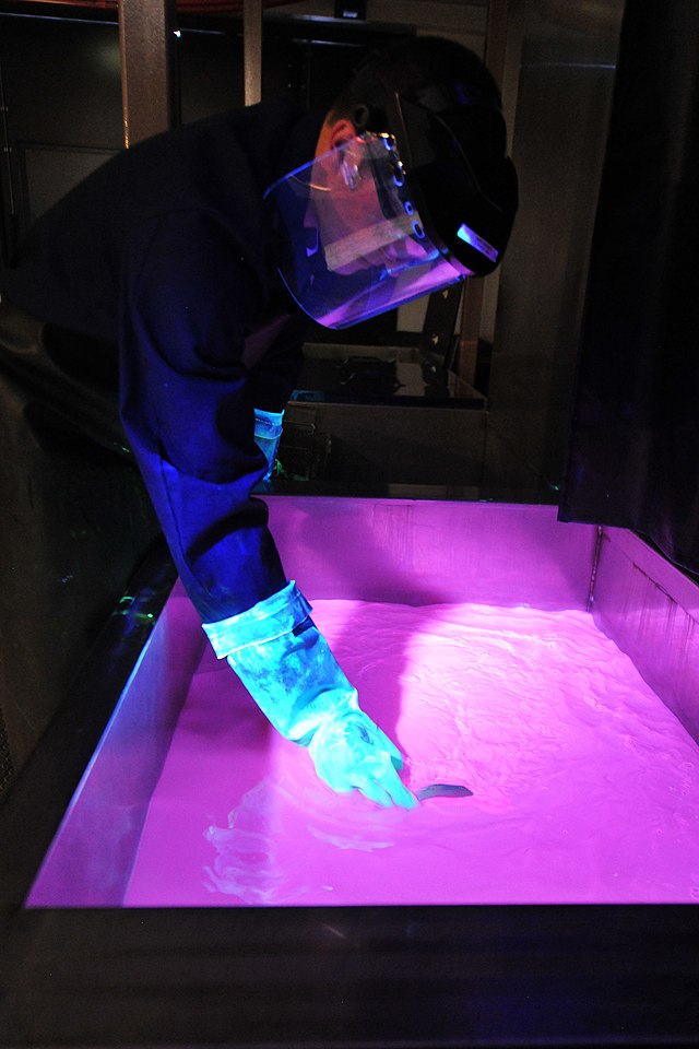Man Conducts Non-Destructive Testing (NDT) on Aircraft Components