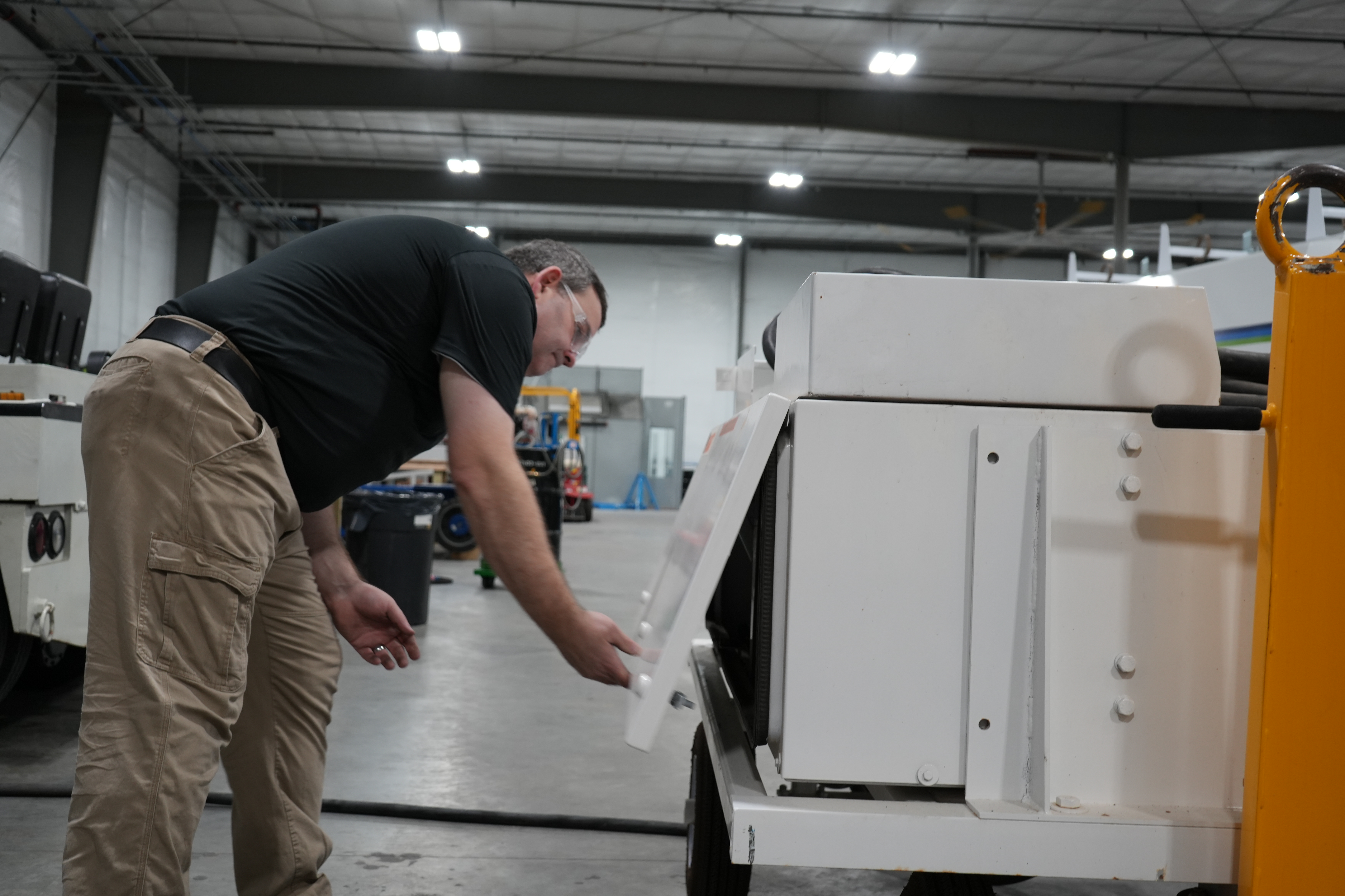 PJi Service Technician Inspecting a Mobile Ground Power Unit (GPU)