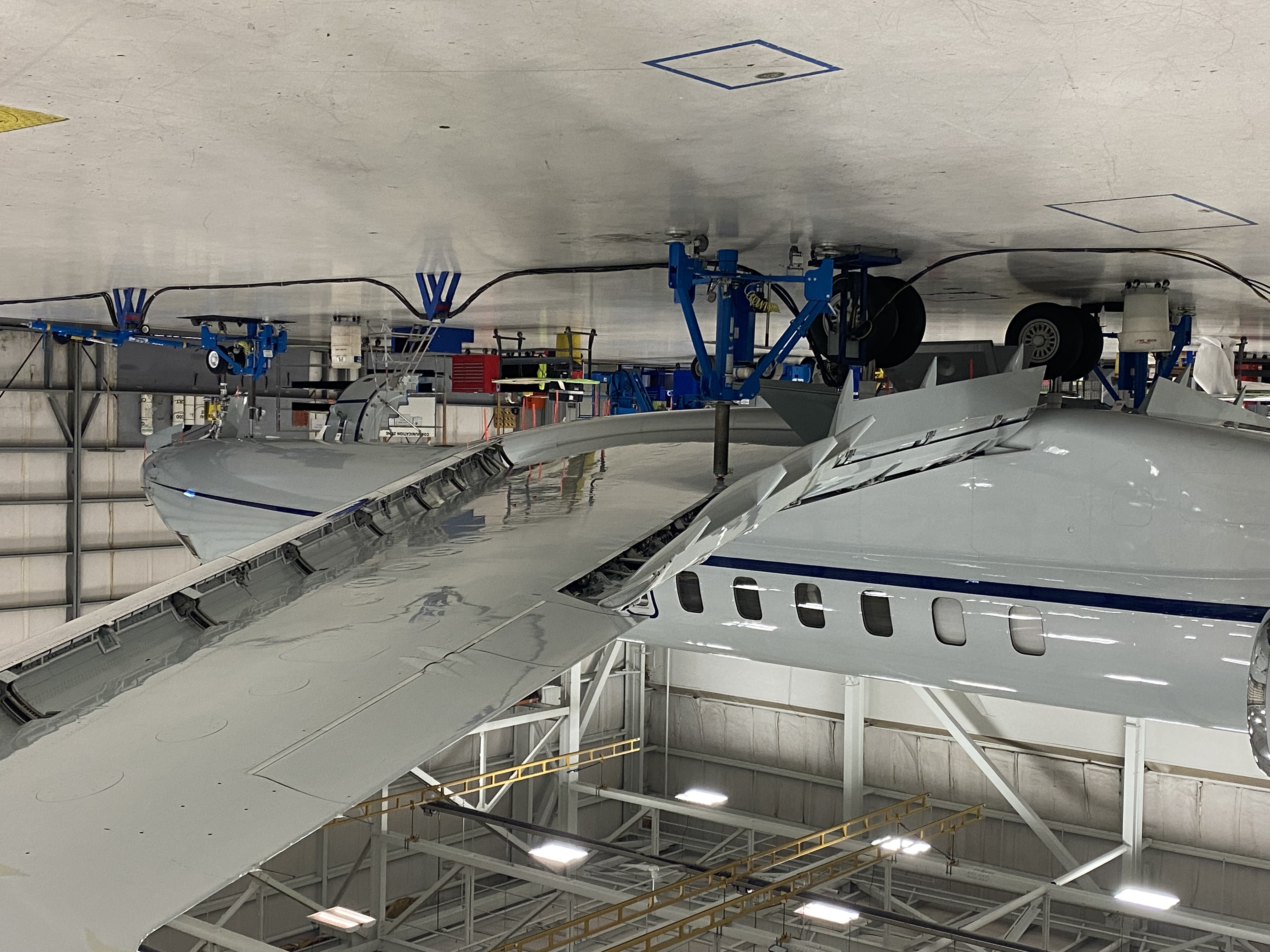 Bombardier Aircraft Lifted on Jacks for Maintenance