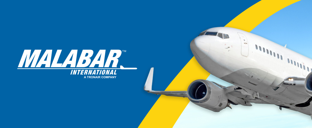The Malabar International A Tronair Company logo over a blue background with a rounded yellow strip with a commercial aircraft flying.