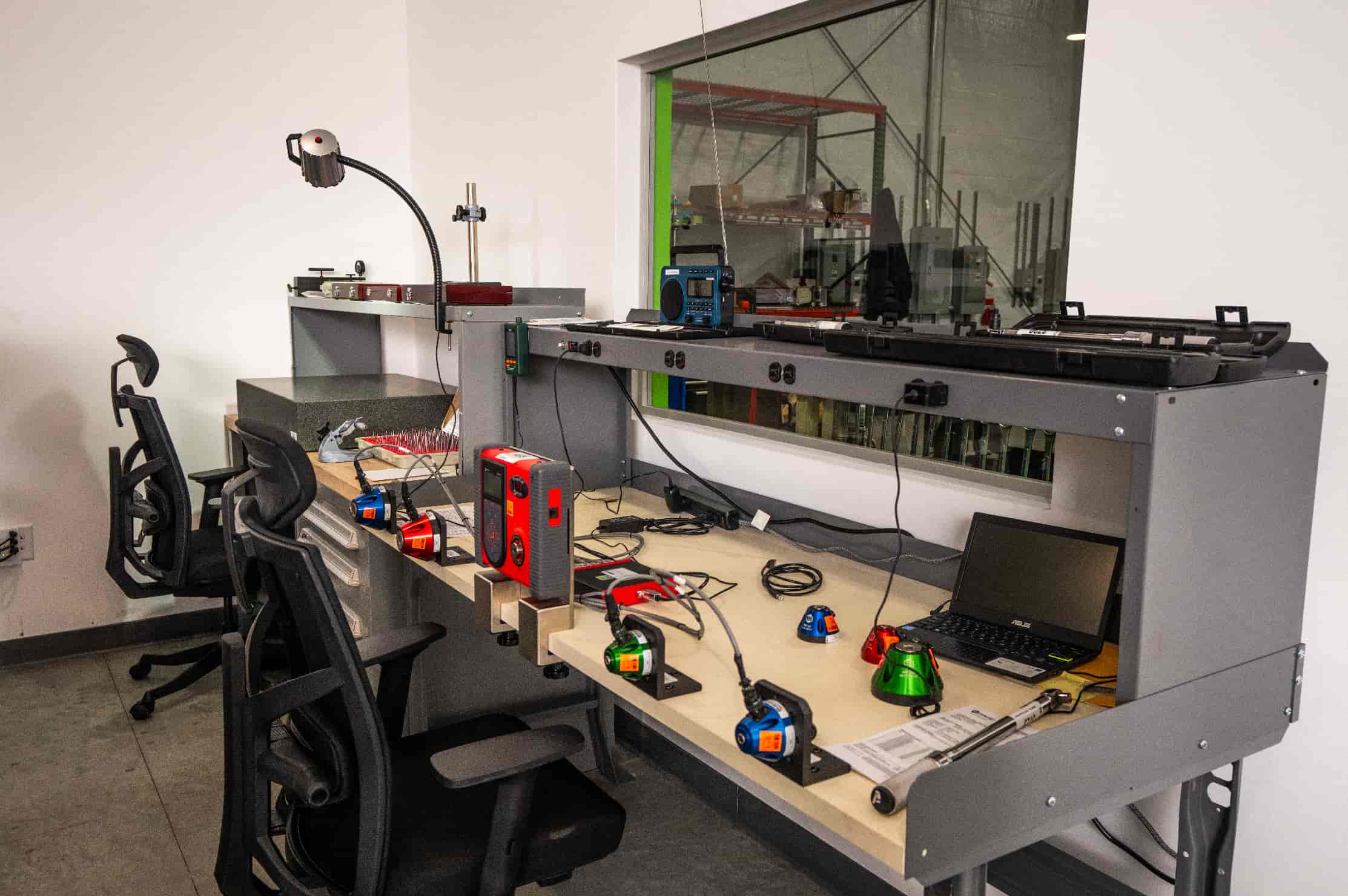 Inside PJi's Calibration Lab &ndash; Calibration Equipment Arrayed on a Desk