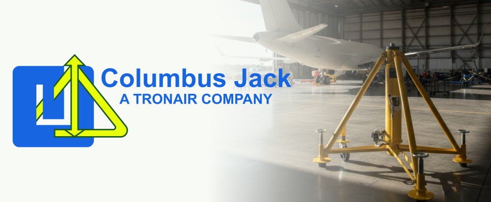 Columbus Jack logo with âA Tronair Companyâ beside a hangar scene with a yellow tripod aircraft jack.